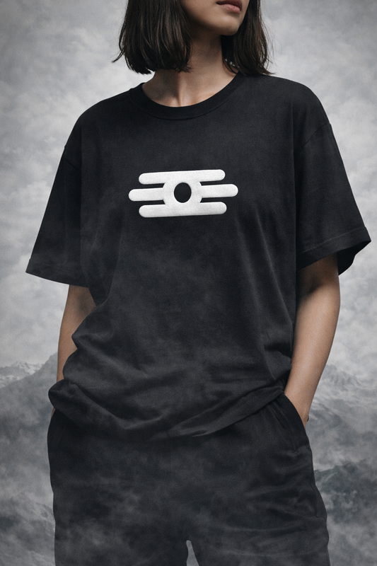 Front view of The Still Force Black Oversized T-Shirt by Tee-Verse